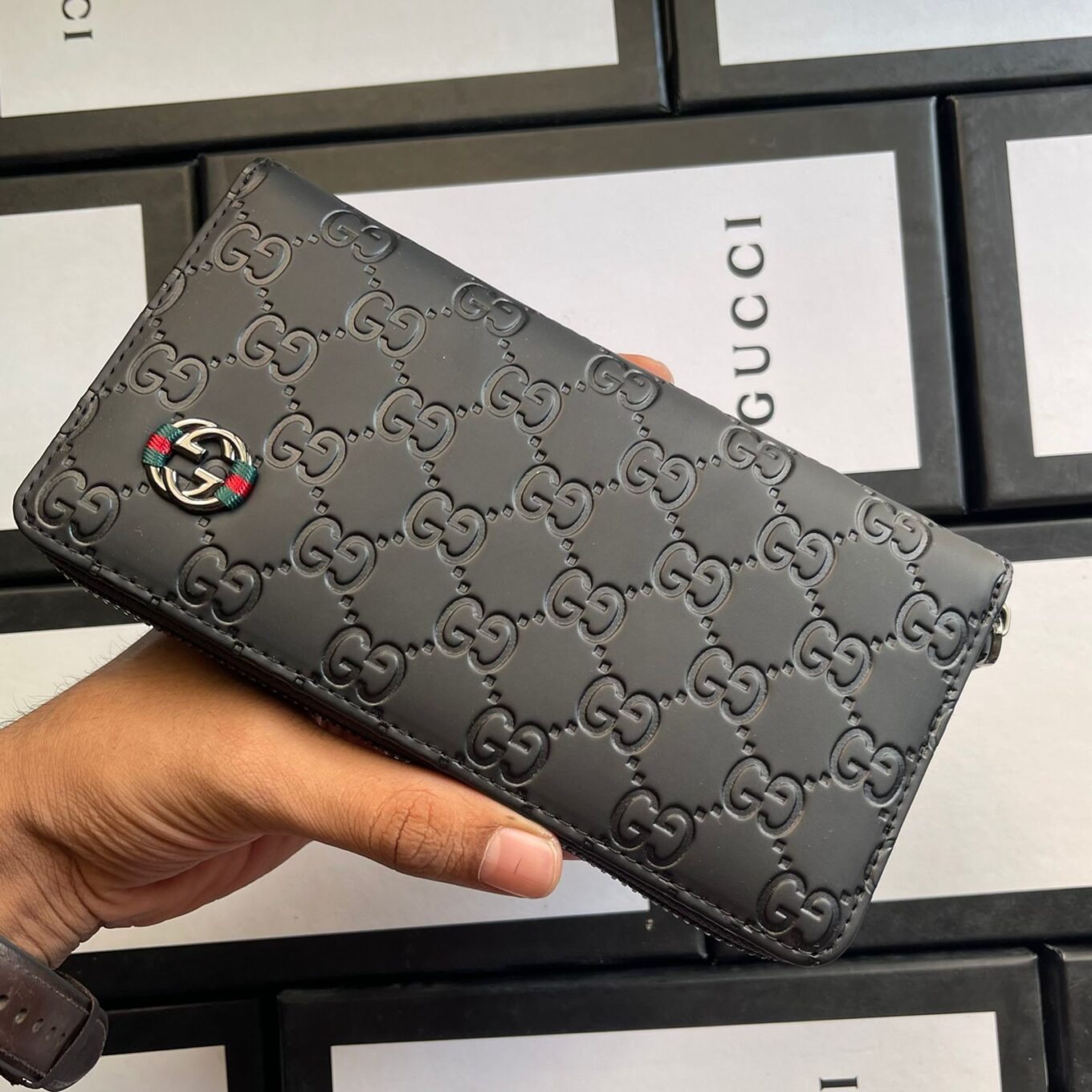 Gucci Reverse GG Embossed Matte Leather Wallet