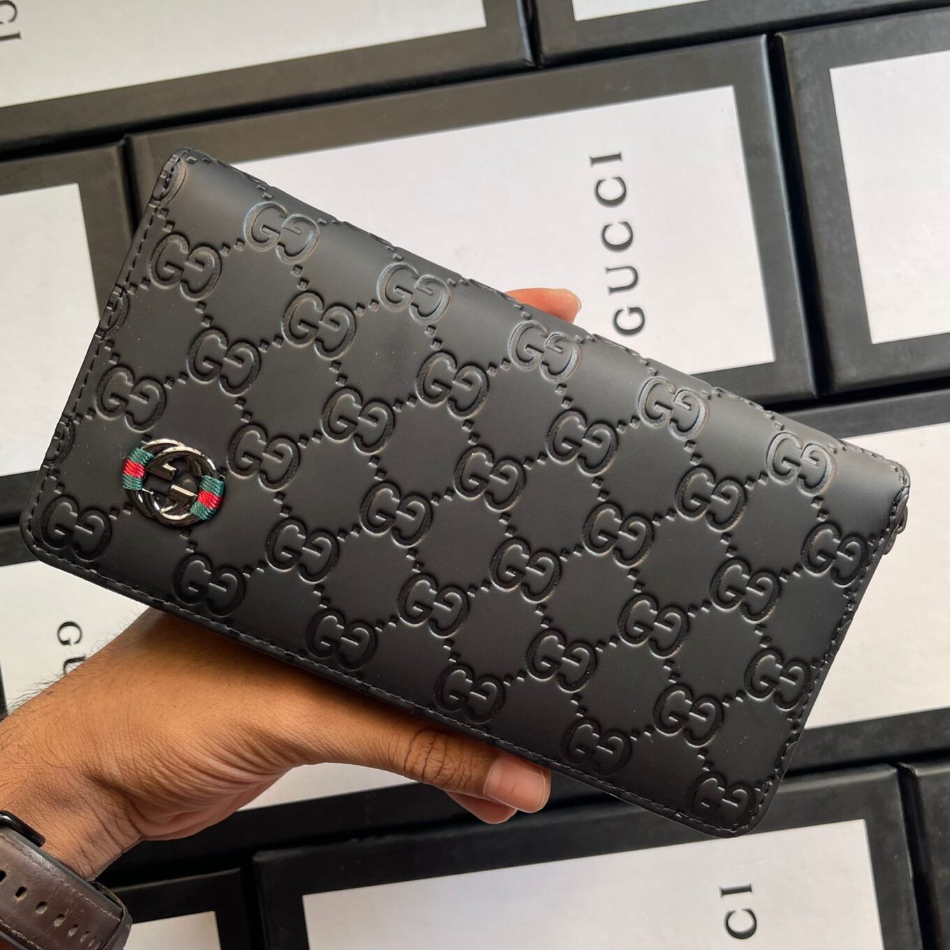 Gucci Reverse GG Embossed Matte Leather Wallet