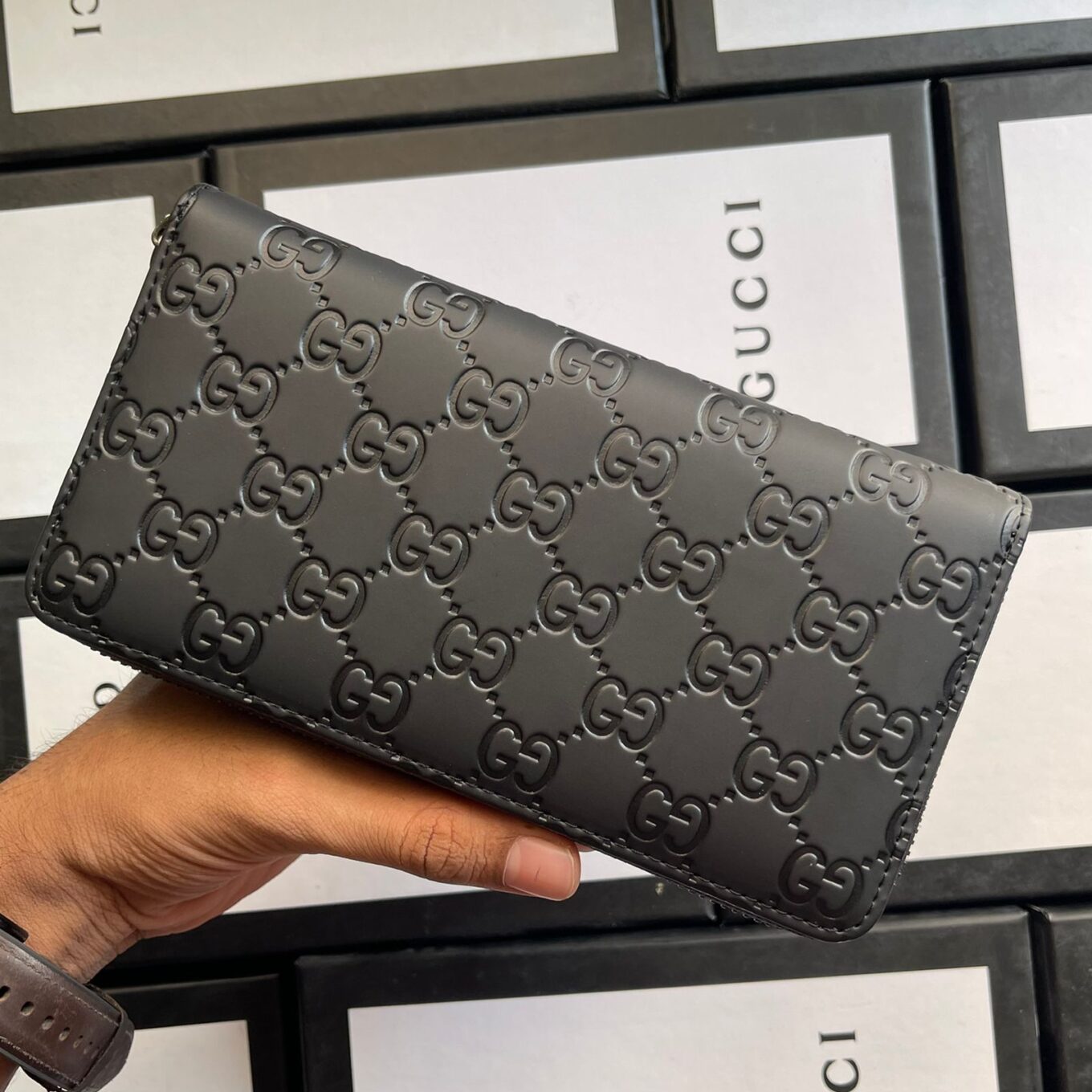 Gucci Reverse GG Embossed Matte Leather Wallet