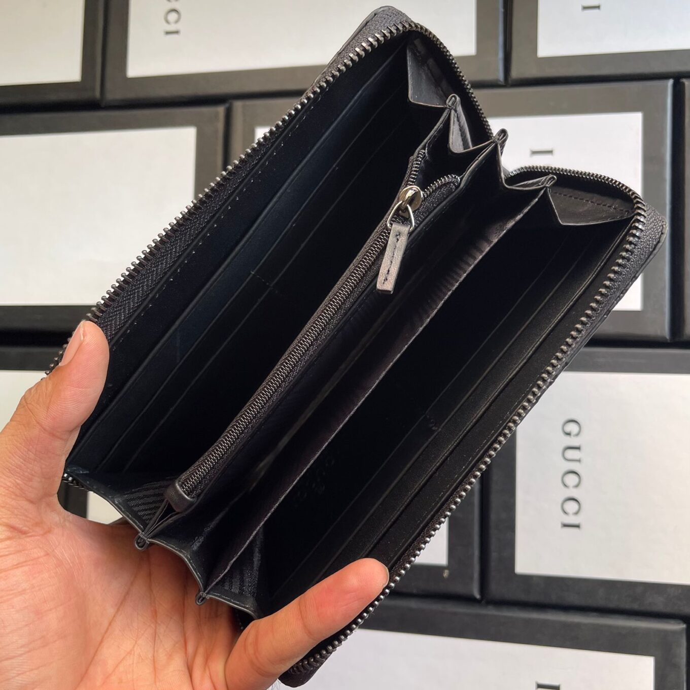 Gucci Reverse GG Embossed Matte Leather Wallet