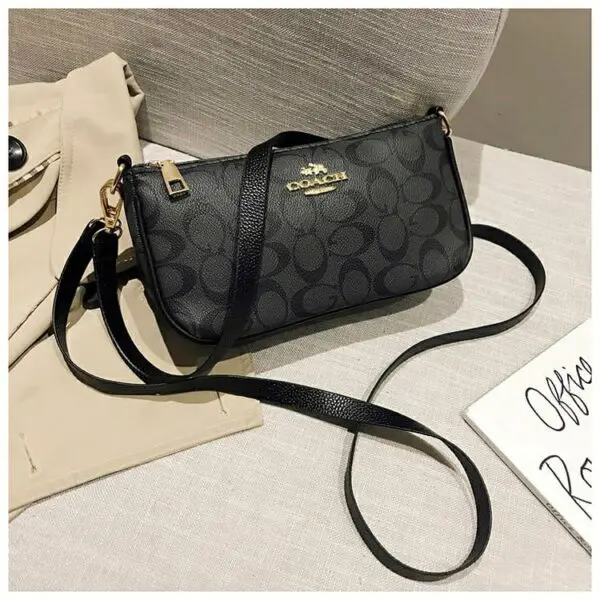 Coach black sling on sale bag