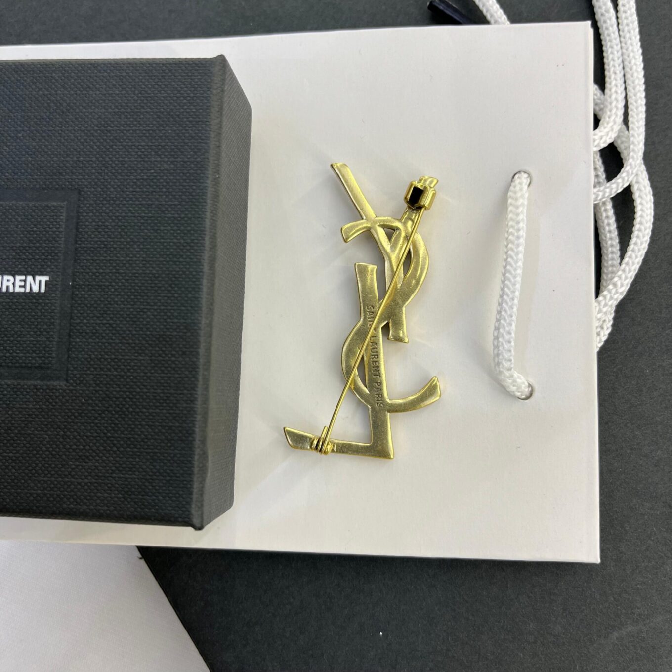 YSL Golden Monogram Brooch