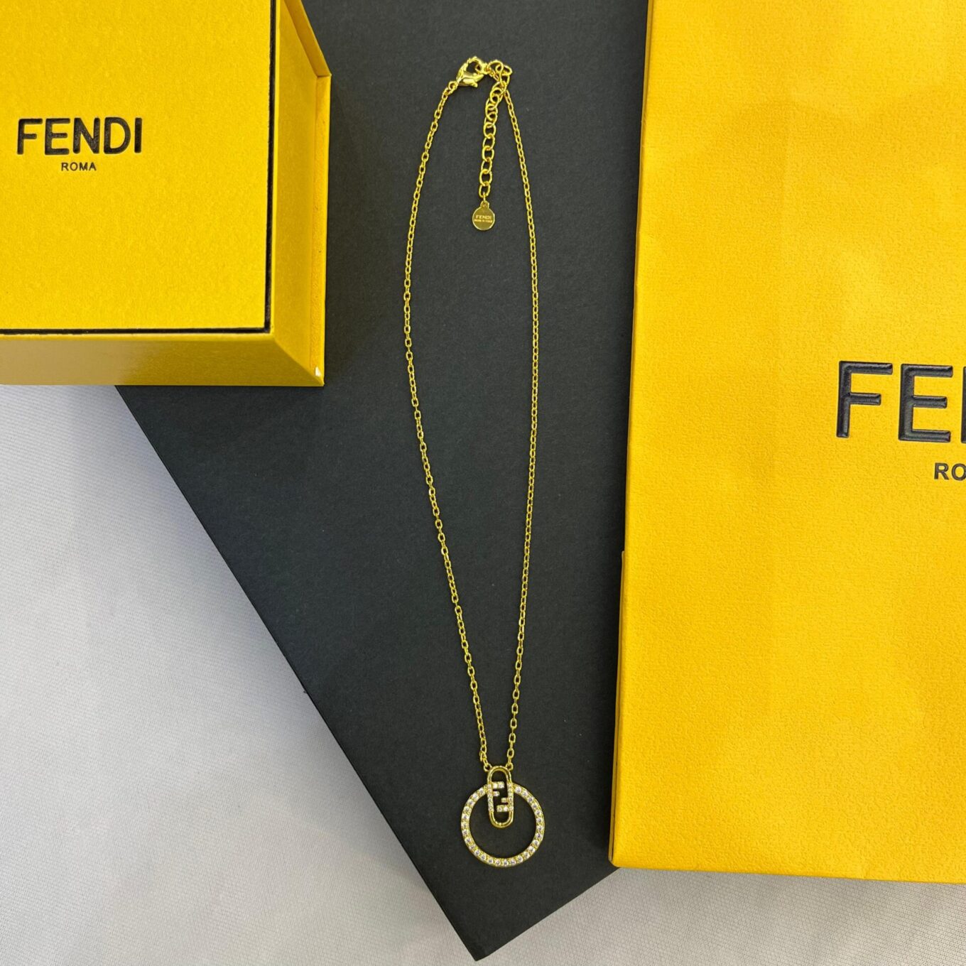 Fendi F Logo Round Pendant Necklace - TheLuxuryTag