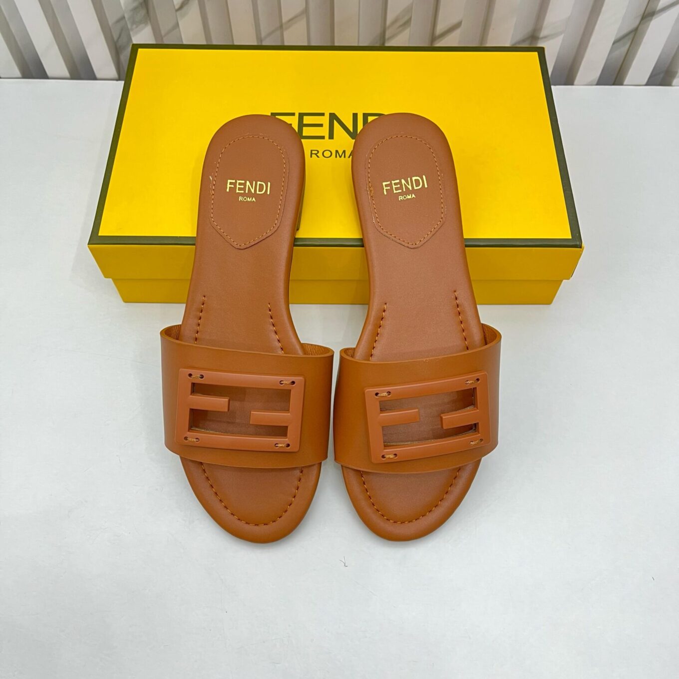 FENDI BAGUETTE SLIPPERS IN PEAR GREEN LAMBSKIN WITH GOLD HARDWARE