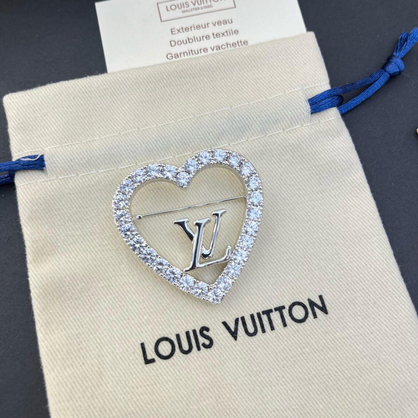 WhatsApp Image 2025-03-07 at 4.55.39 PM (1) Louis Vuitton Love Silver Brooch