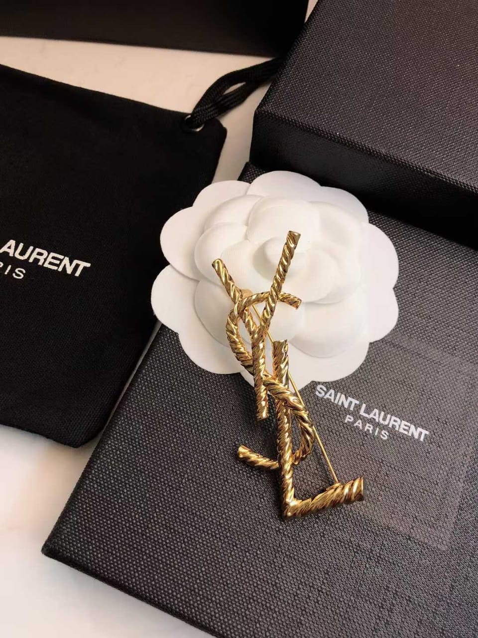 WhatsApp Image 2025-03-07 at 5.53.28 PM YSL Golden Spiral Logo Brooch