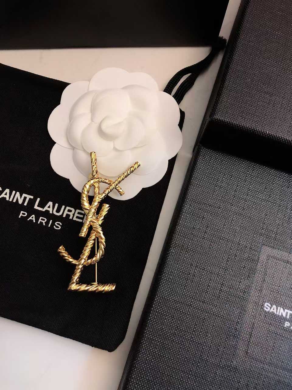 WhatsApp Image 2025-03-07 at 5.53.29 PM YSL Golden Spiral Logo Brooch