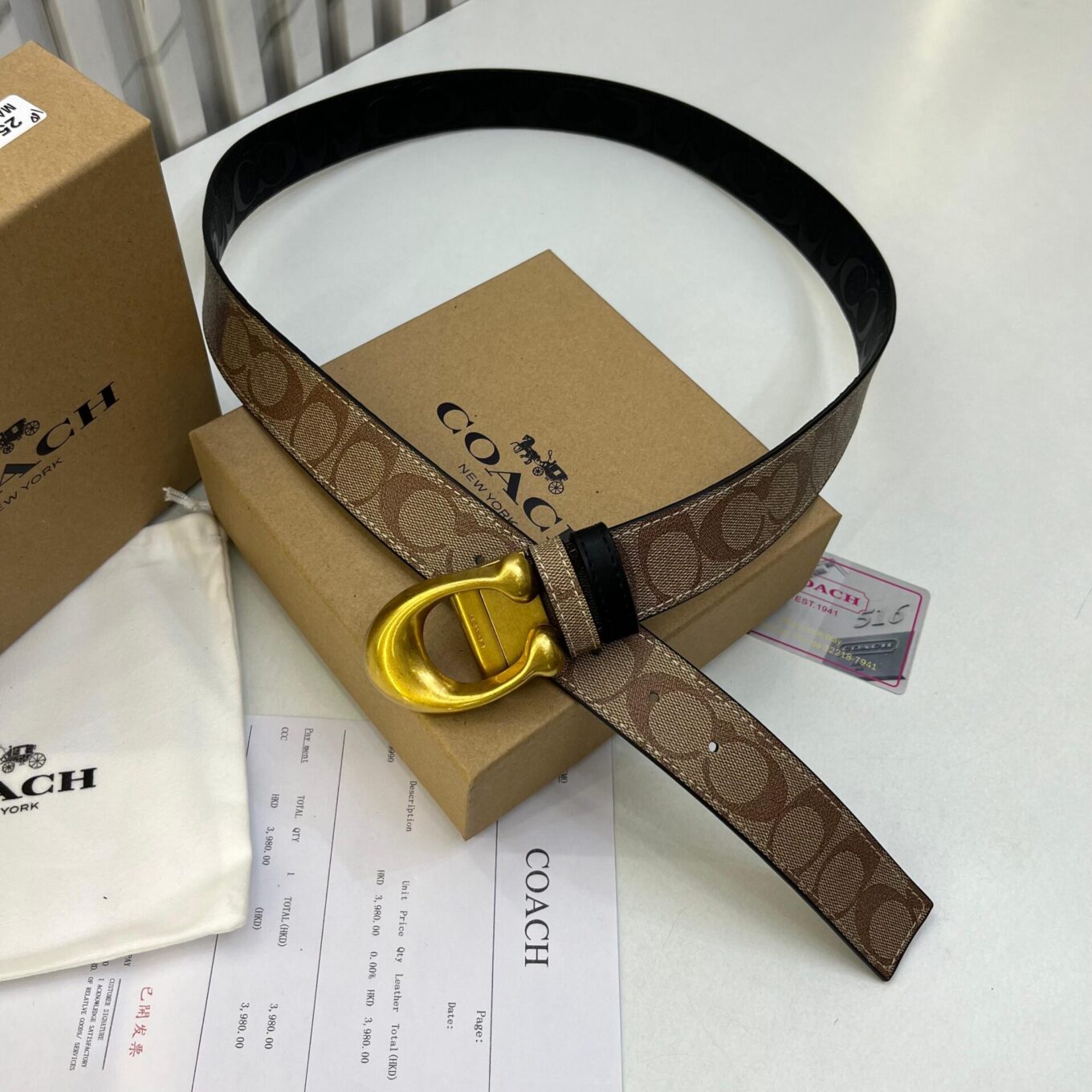 WhatsApp Image 2025-06-26 at 4.41.10 PM Coach Apricot Black Embossed Reversible Belt For Men