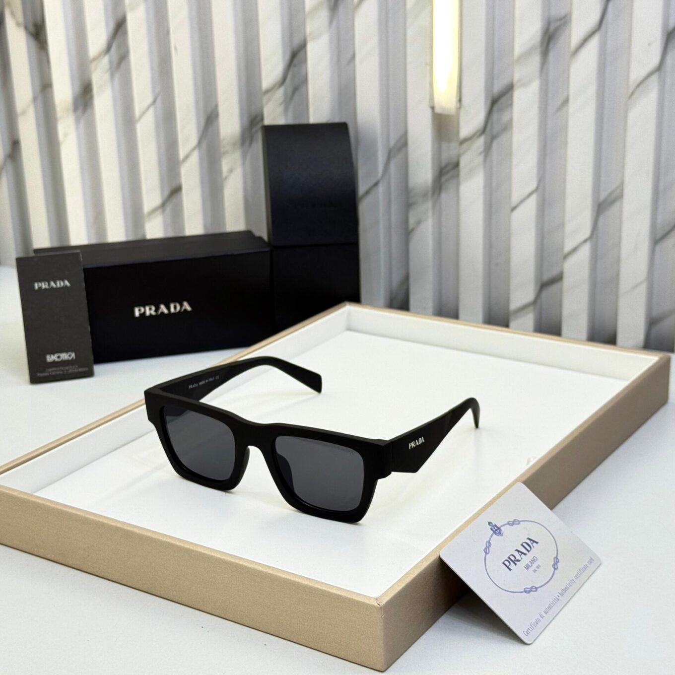 Prada Rectangular Black unisex Sunglasses