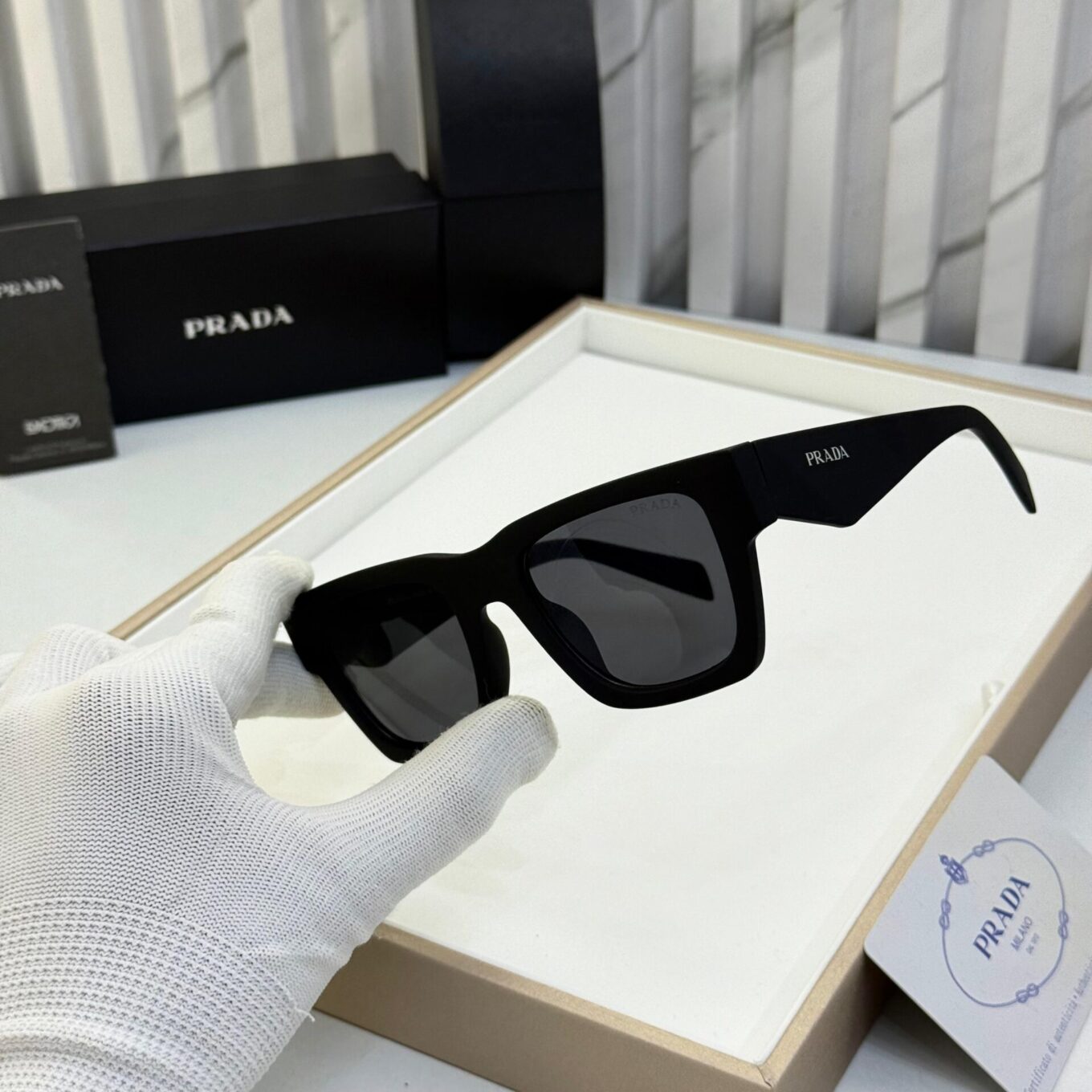 Prada Rectangular Black unisex Sunglasses