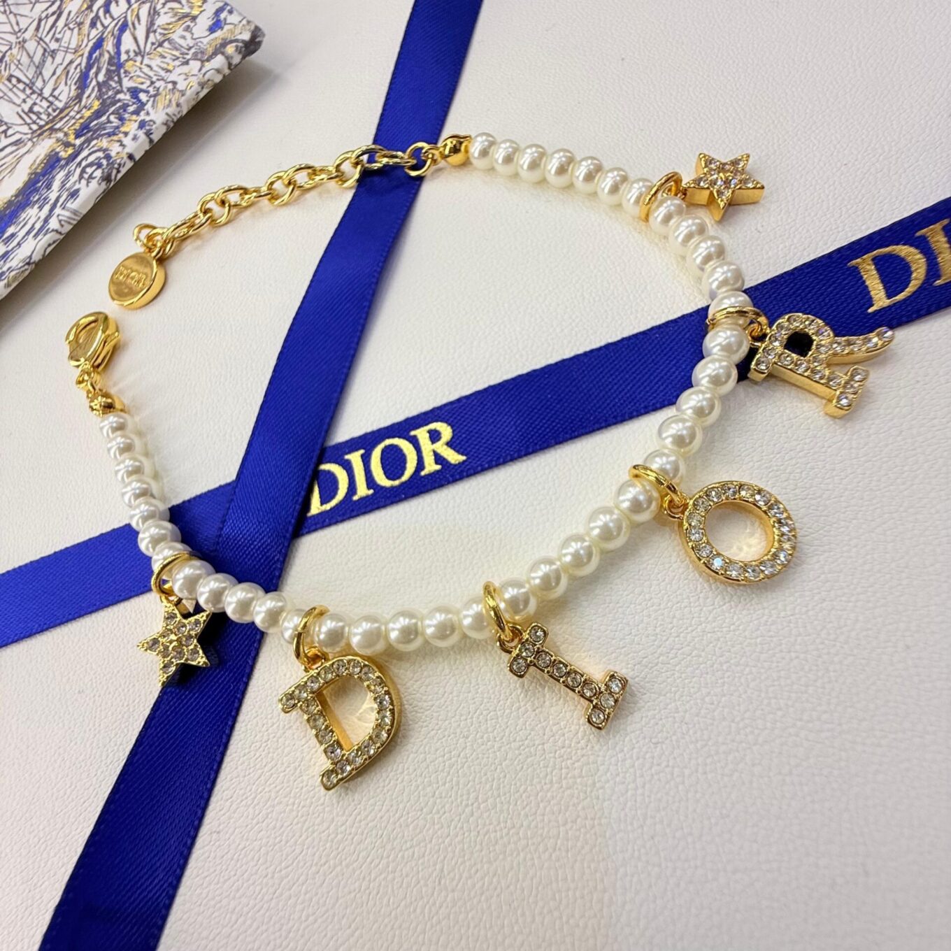 WhatsApp Image 2025-09-05 at 8.06.04 PM Dior Pearl Star Gold Color Women’s Bracelet