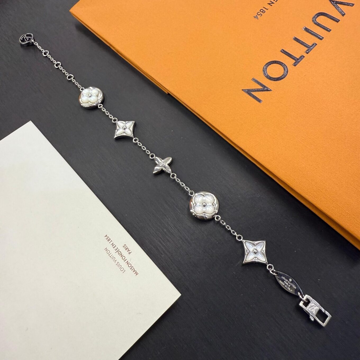 WhatsApp Image 2025-09-05 at 8.33.30 PM (1) Louis Vuitton Iconic Flowragram Silver Color Bracelet