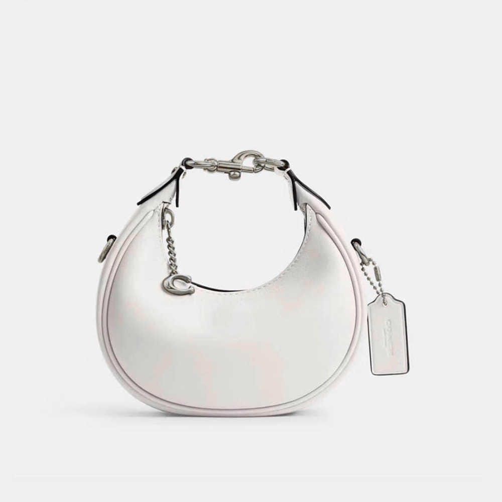 WhatsApp Image 2025-09-06 at 6.28.20 PM (1) Coach Jonie Crossbody Sling White Bag (With Box)