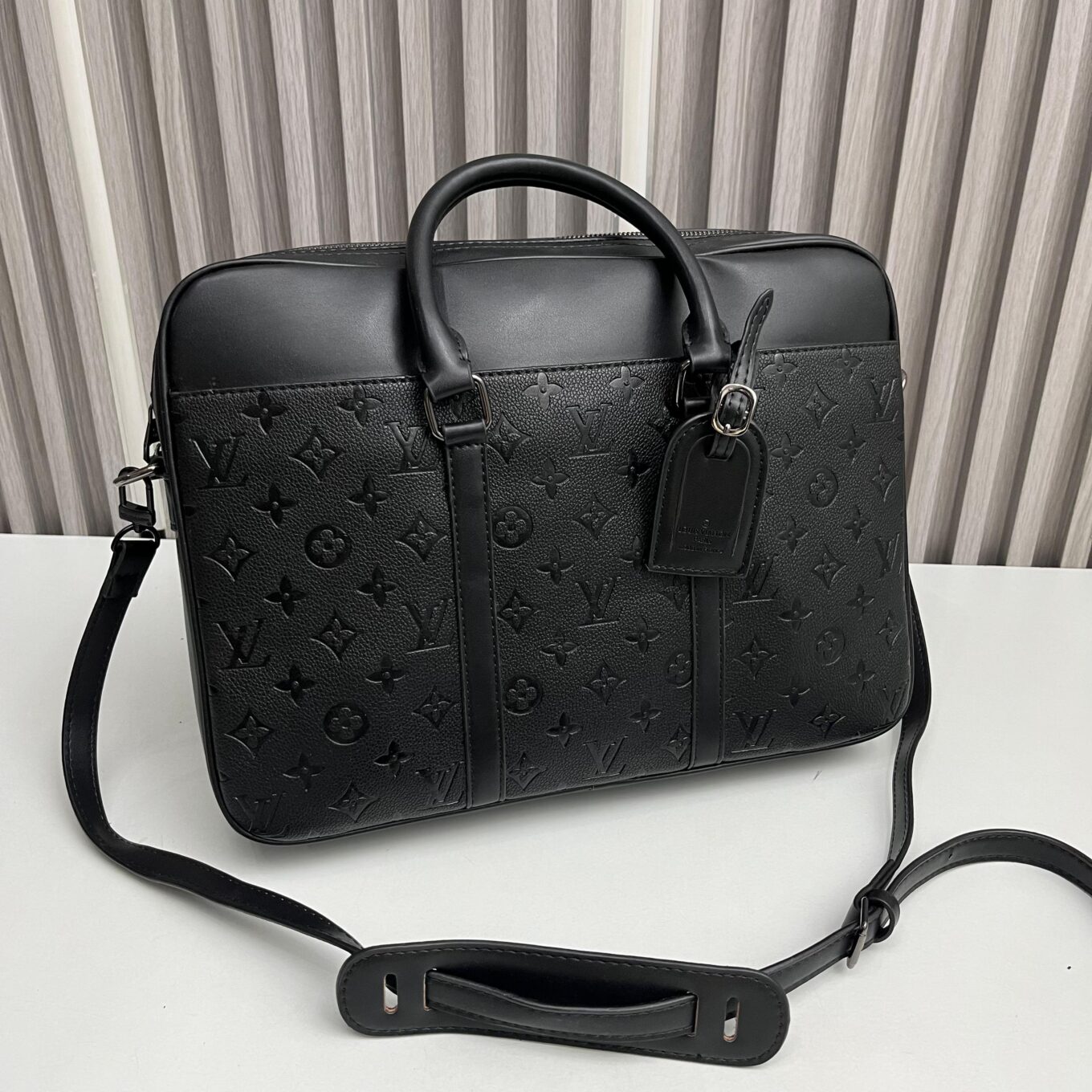 WhatsApp Image 2025-09-26 at 4.53.06 PM (1) Louis Vuitton Embossed Signature Laptop Bag