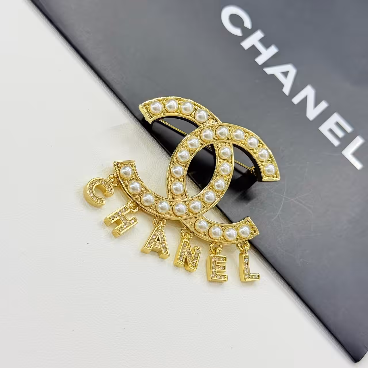 WhatsApp Image 2025-11-17 at 8.00.49 PM Chanel Pearl Studded Gold Charm Brooch