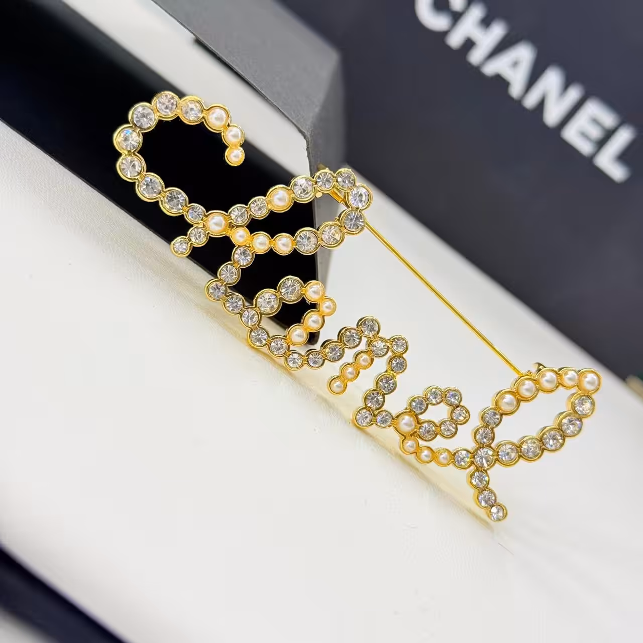 WhatsApp Image 2025-11-17 at 8.06.02 PM Chanel Crystal Monogram Brooch