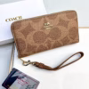 WhatsApp Image 2025-12-02 at 7.27.32 PM Coach Apricot Long Zipper Wallet
