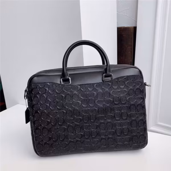WhatsApp Image 2025-12-18 at 10.25.52 PM Coach Embossed Premium Laptop Bag