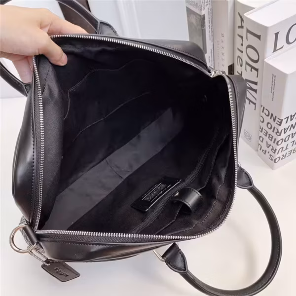 WhatsApp Image 2025-12-18 at 10.25.53 PM (1) Coach Embossed Premium Laptop Bag