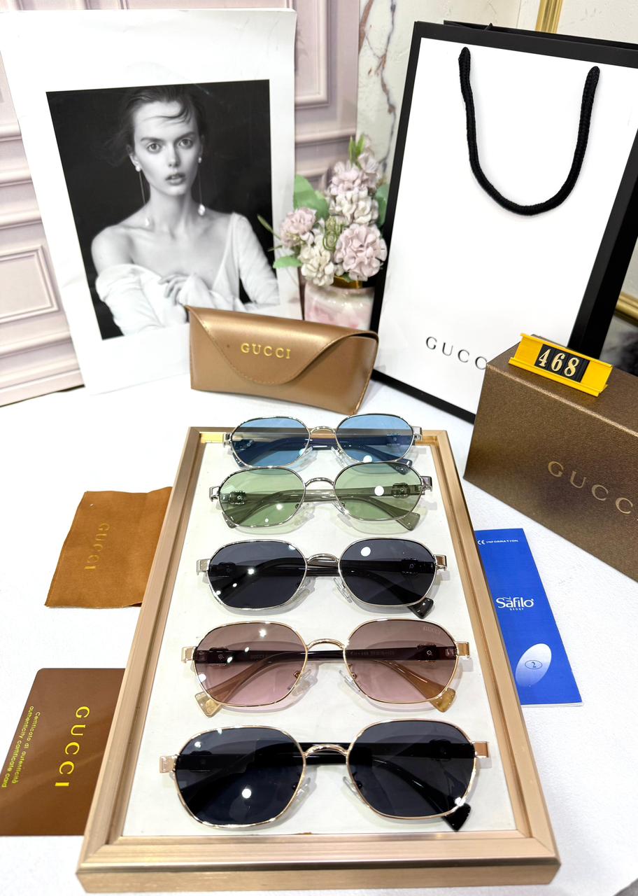 Gucci Silver Oval Unisex Sunglasses