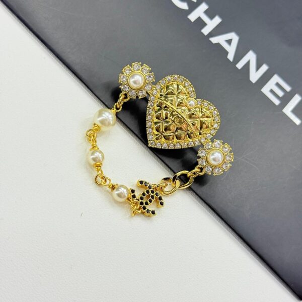 WhatsApp Image 2026-02-17 at 9.47.39 PM Chanel Golden Quilted Heart Brooch