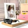 Miu Miu Black Wayfarer Women’s Sunglass