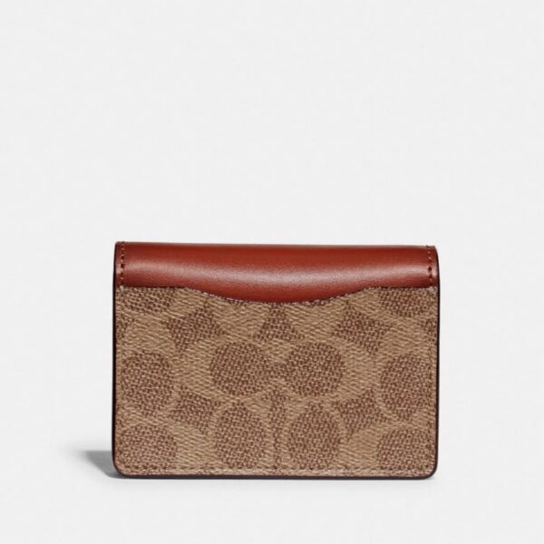 Coach Half Flap Brown Mini Sling Bag