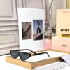 Miu Miu Black Cat Eye Women’s Sunglass