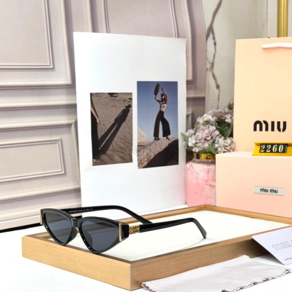 Miu Miu Black Cat Eye Women’s Sunglass