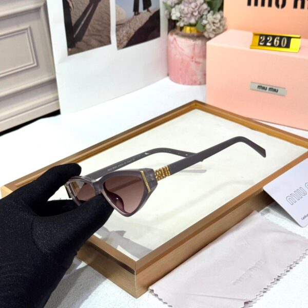 Miu Miu Dark Gray Cat Eye Women’s Sunglass