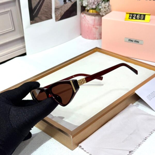 Miu Miu Dark Red Cat Eye Women’s Sunglass