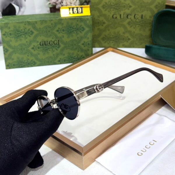 Gucci Oval Dark Blue Tint Women’s Sunglass
